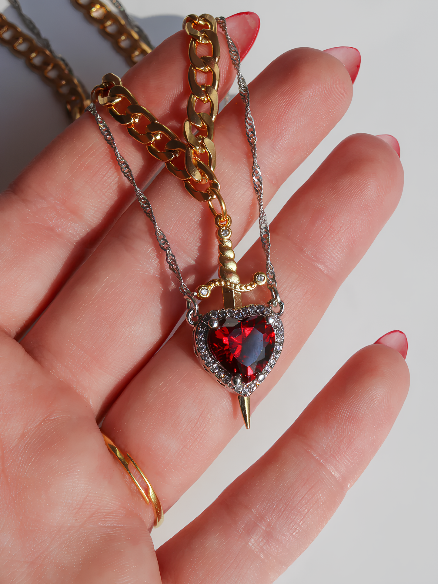 Heart and Sword Snow White Necklaces