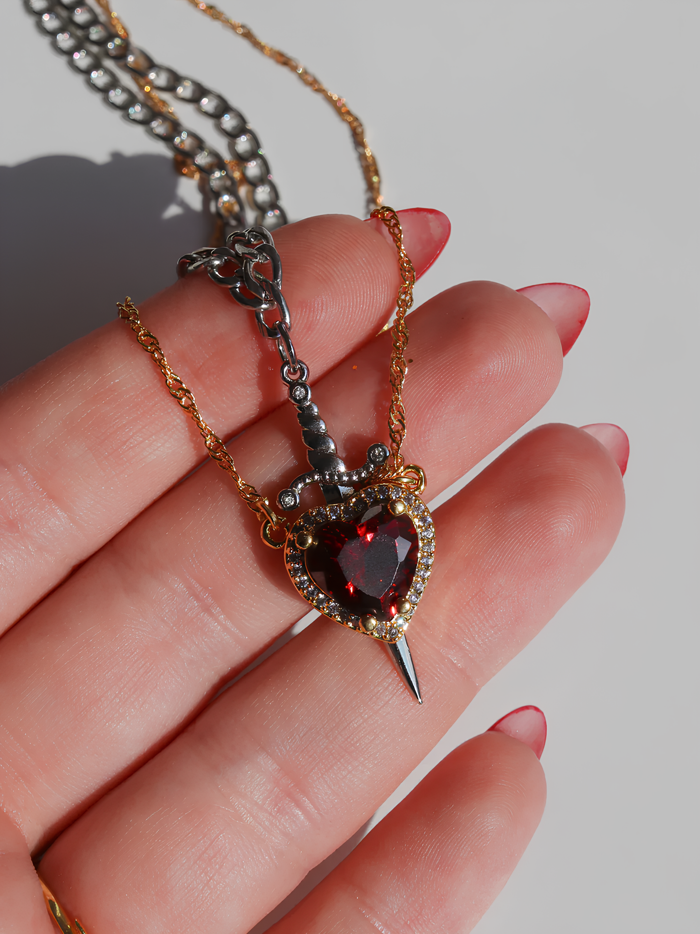Heart and Sword Snow White Necklaces
