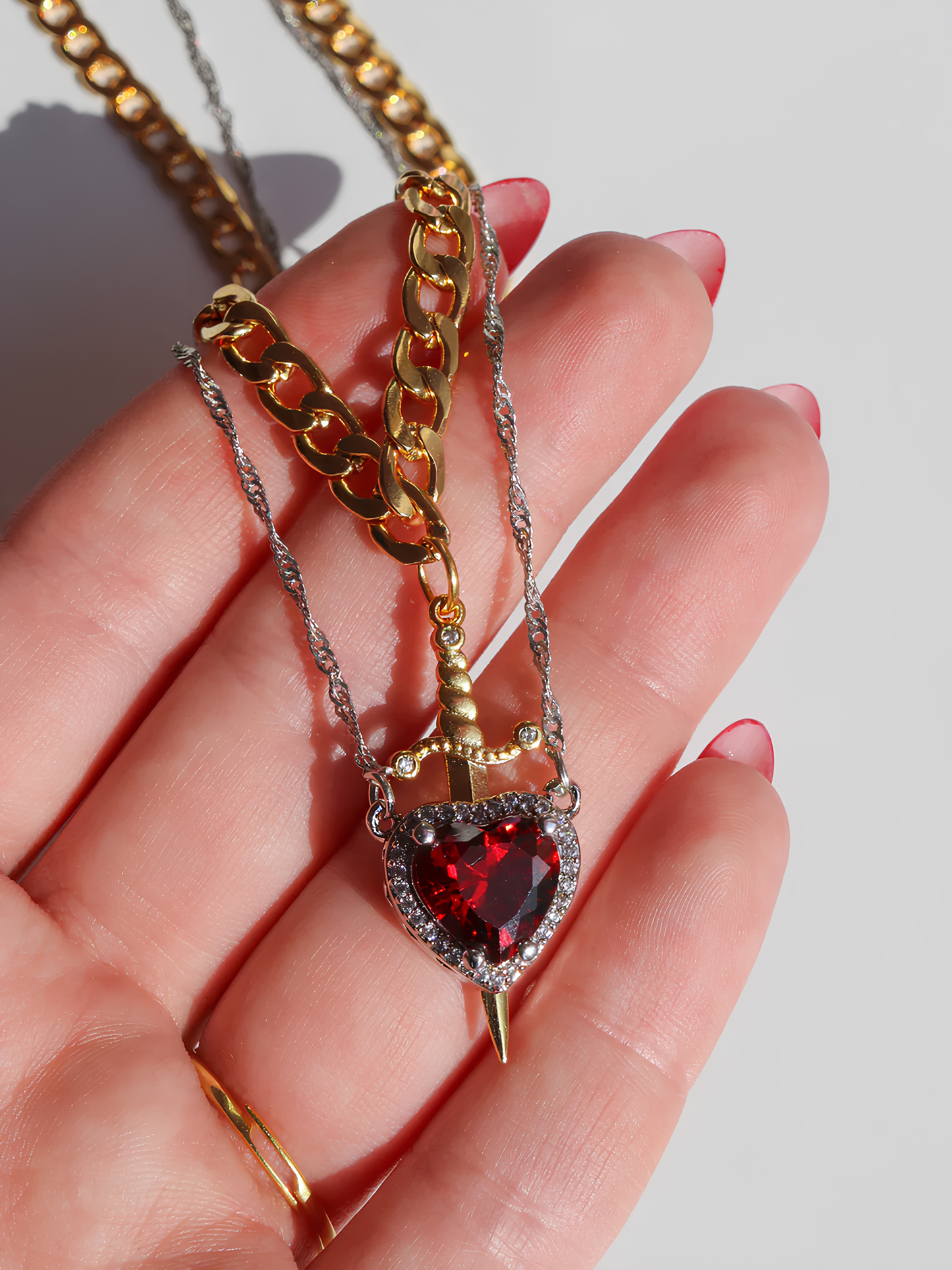 Heart and Sword Snow White Necklaces
